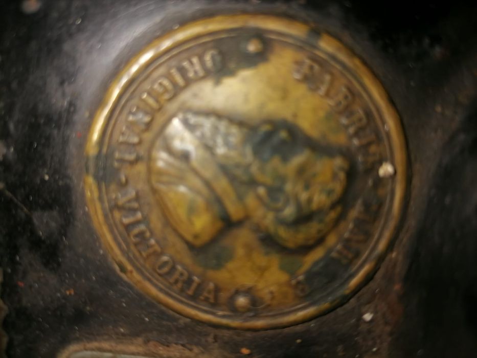 Masina de custut singer