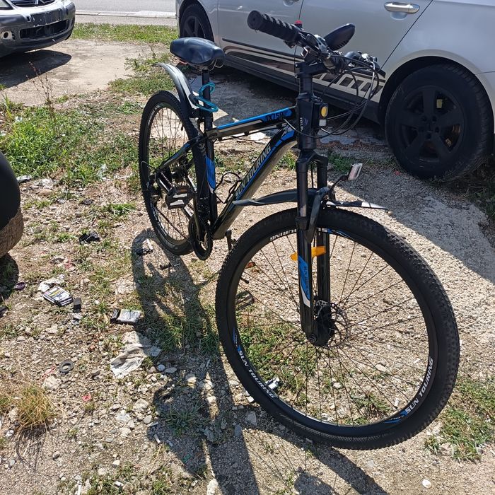 Bicicleta aproape noua