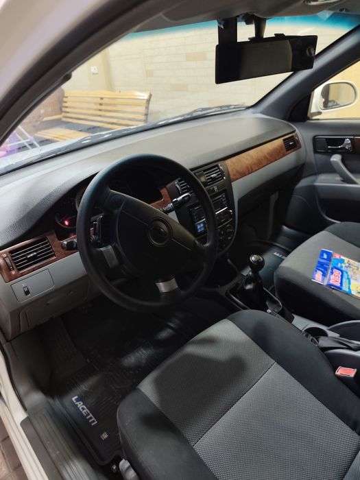 Lacetti 1.8 бир қўл мошина