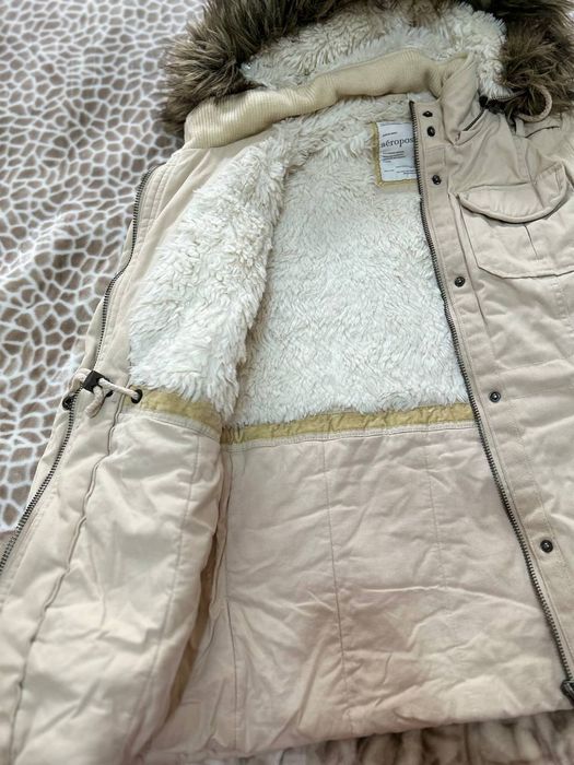 Продаю б/у теплую куртку 46 размера