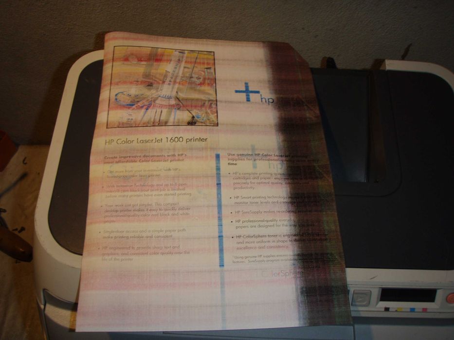 Imprimanta laser color cu placa de retea HP 1600, murdareste foaia