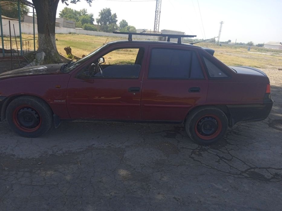 Нексия 2 йили 2009 холати яхши