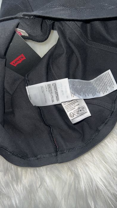 Colanti holografici Guess S si top Levi’s M