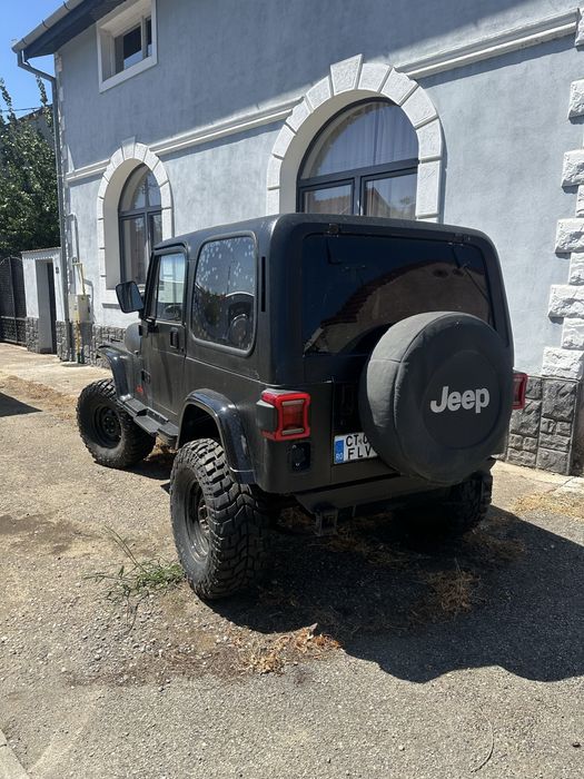 Vand Jeep Wrangler sau schimb cu Rolex