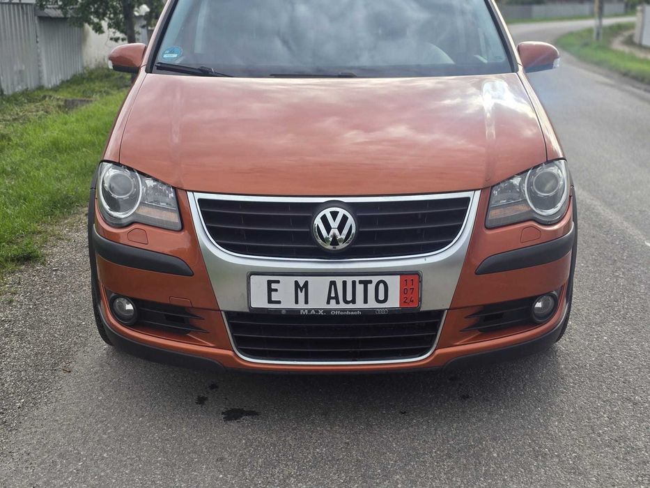 Touran Cross 1.9 Diesel,105 cai