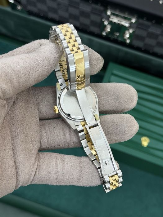 Rolex Datejust 31 Yellow Rolesor – Red Diamond Dial Jubilee
