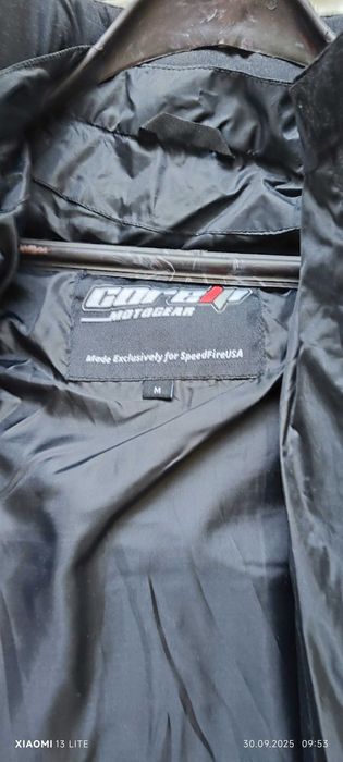 Текстилно мото яке ново  размер М.