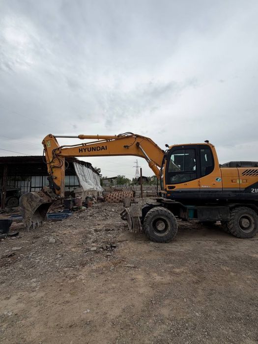 Hyundai 210 экскаватор