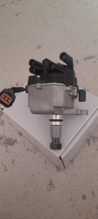 Комутатор , трамблер на Мазду S5.