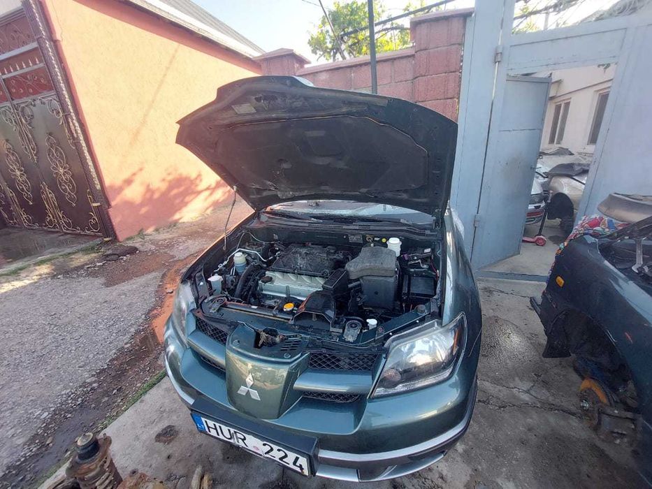 двuгaтeль mivec на mitsubishi outlander