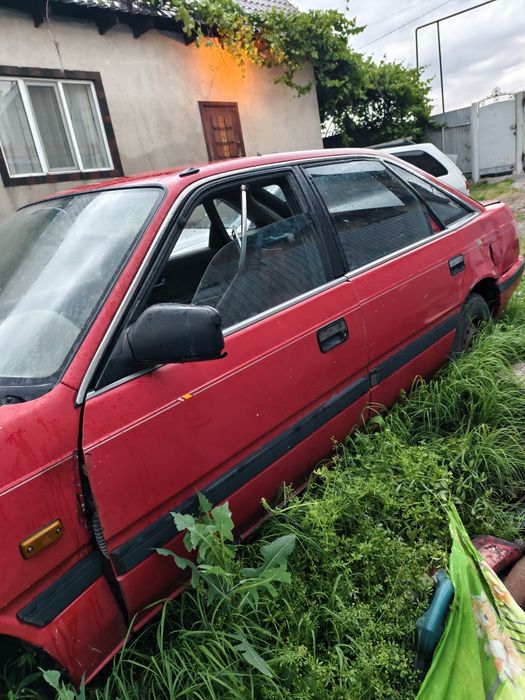 Машина Mazda  626