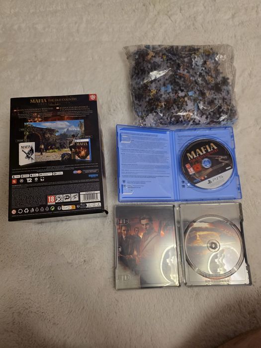 Joc PS5 Mafia: The Old Country - Launch Edition (Ediție Limitată cu Steelbook și Puzzle)