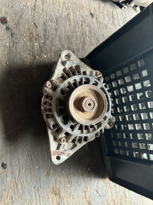 Генератор на митсубиси 2.4 амереканец