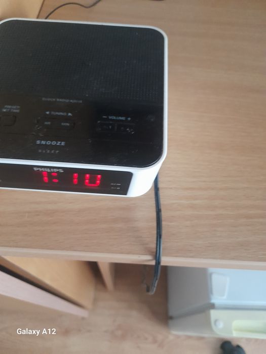 Radio cu ceas Philips, modelul AJ3115.