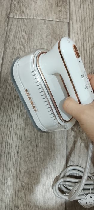 Продам новый утюг отпариватель