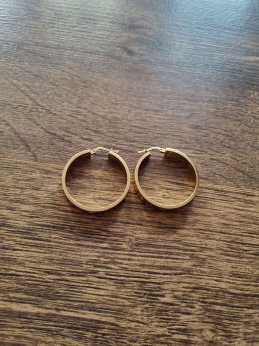 Vand cercei aproape noi de aur model cartier