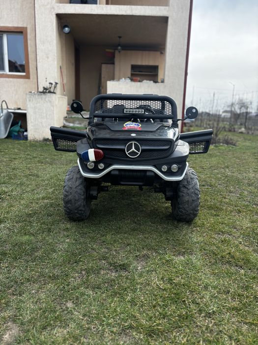 Masinuța 4x4 mercedes unimog 2 locuri