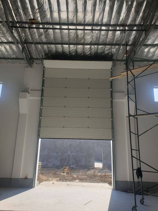 Rolstavni elektron darvoza va eshiklar