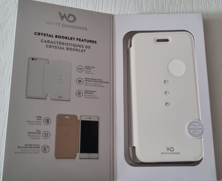 Vând carcasă(husă flip) Iphone 6/6s White Diamonds(swarovski) nouă.