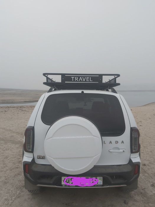 Багажник мошинани томига нивага