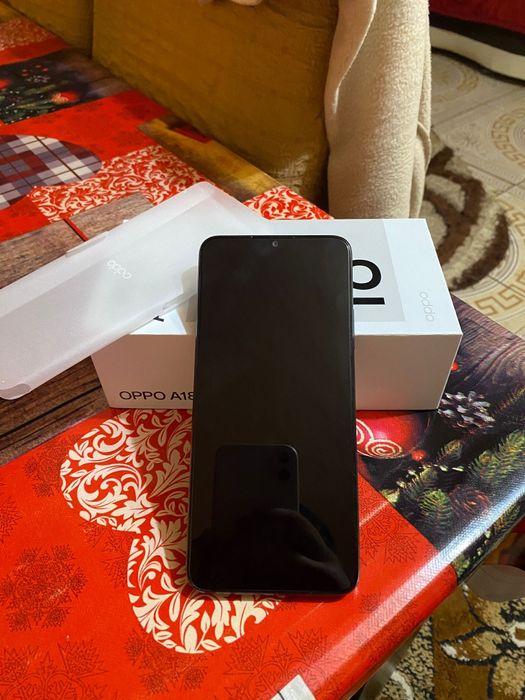 Vând oppo A 18  de 128GB