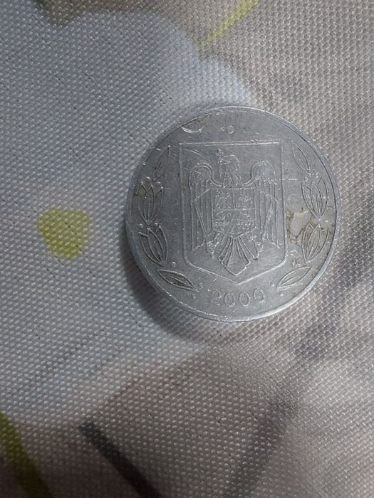 Vând moneda de 500 lei anul 2000