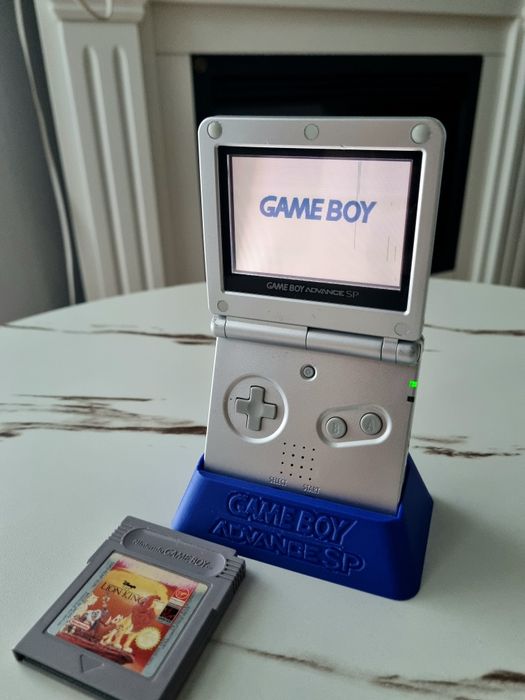 GameBoy Advance SP + The lion king + stand