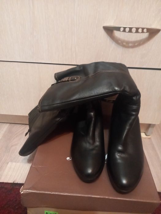 Продам новые сапоги