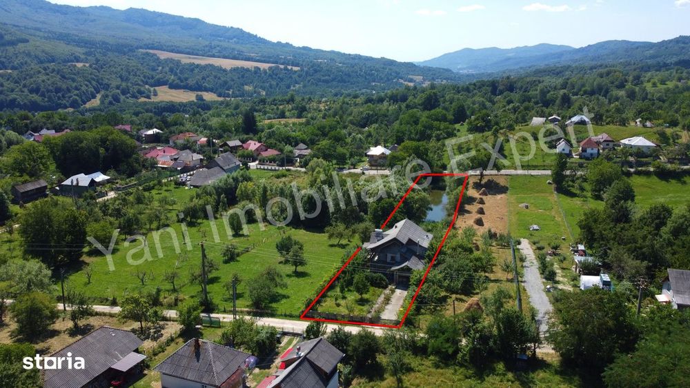 Casă cu lac de pește de vânzare în comuna Nucșoara, județ Argeș.