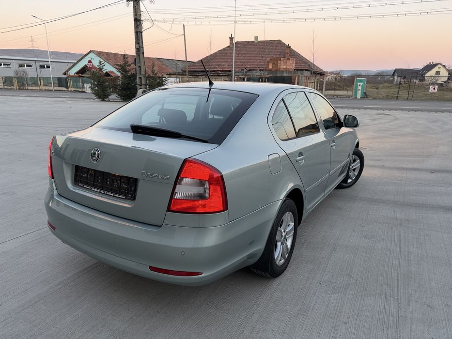 • Skoda Octavia •Model Elegance • 1.4 TSI • 122 CP • An 2011 • Euro 5 • Impecabila •