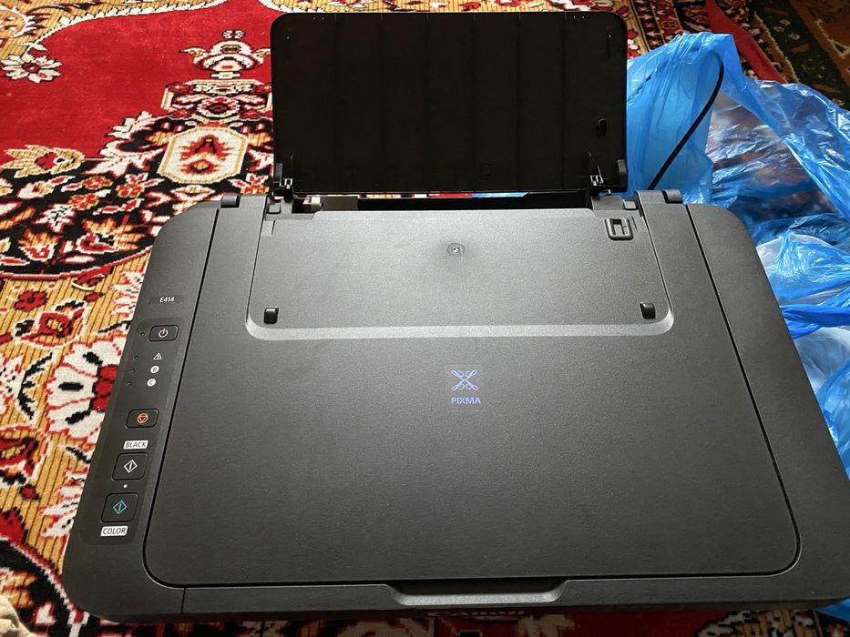 Canon E414 …………..