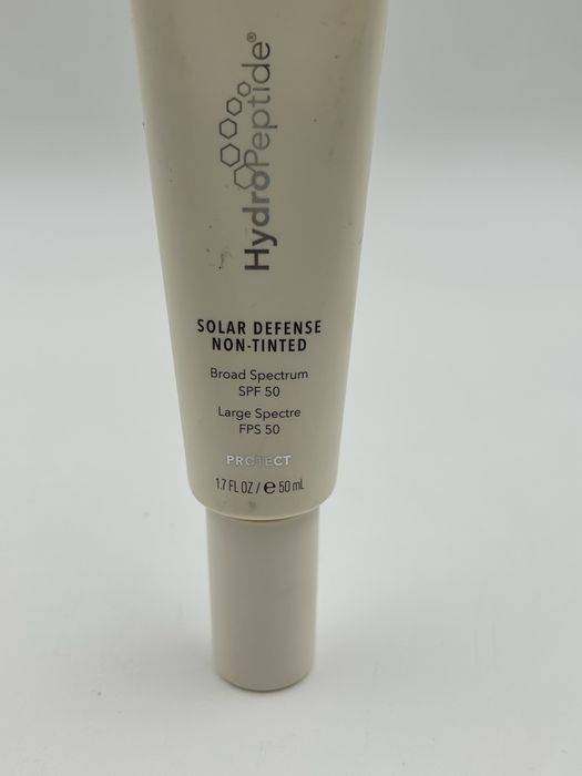 слънцезащитен крем HydroPeptide Solar Defense Non-Tinted SPF 50.