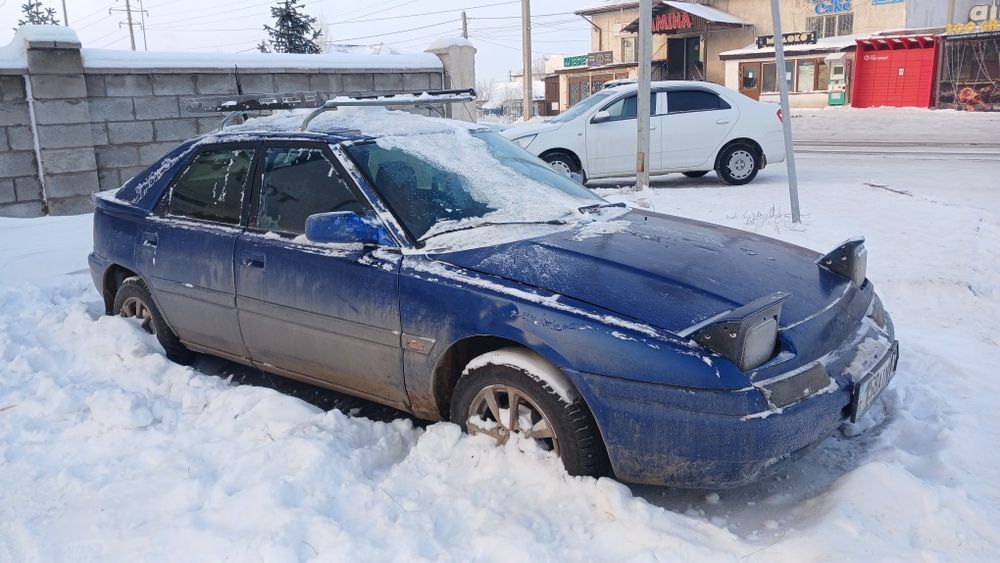 Продам машину Мазда 323