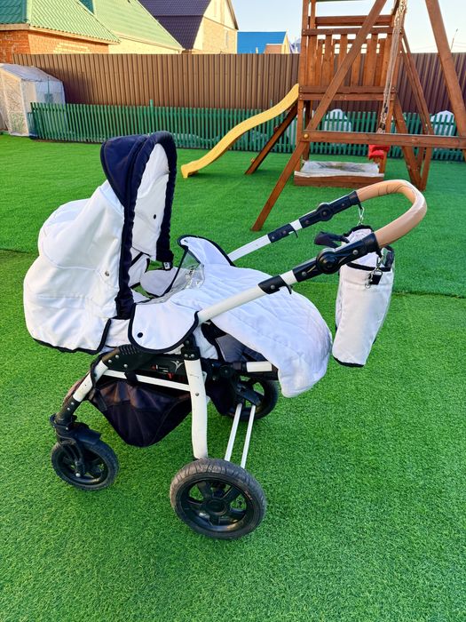 Детская коляска Carino