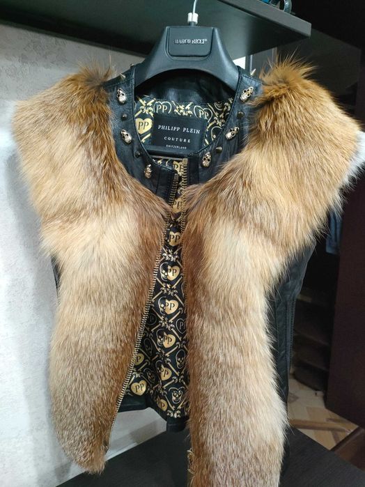 Продам кожаную жилетку