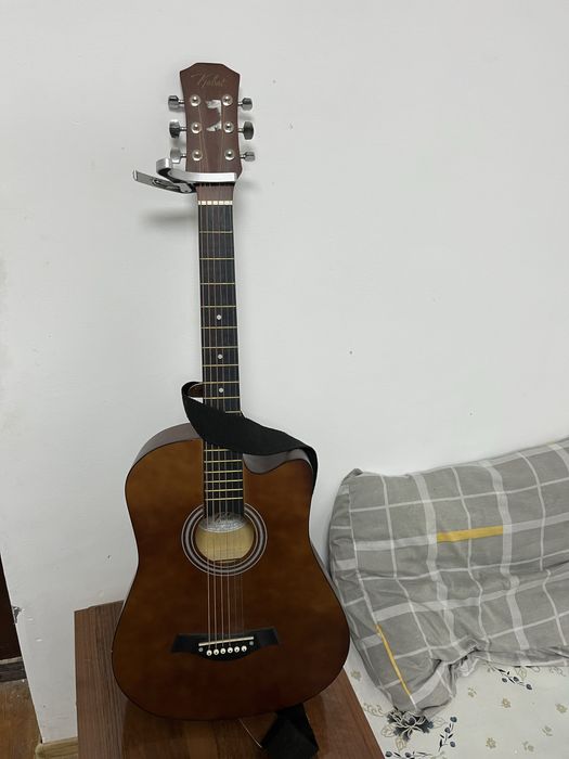 38 размер Гитара холати яхши айиби иук.