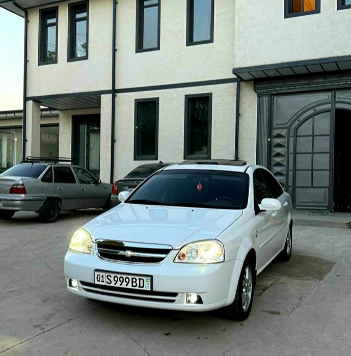 Ласетти 1,6 автомат.2013. Бензин.
