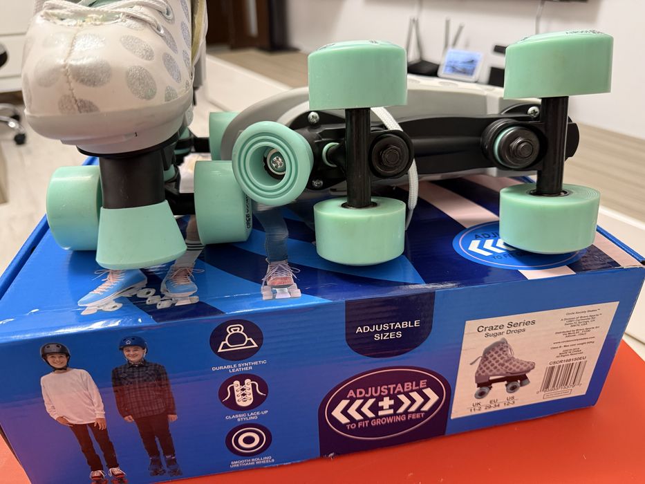 Role decatlon ca noi 32-34 si patine cu rotile Noi la cutie 29-34