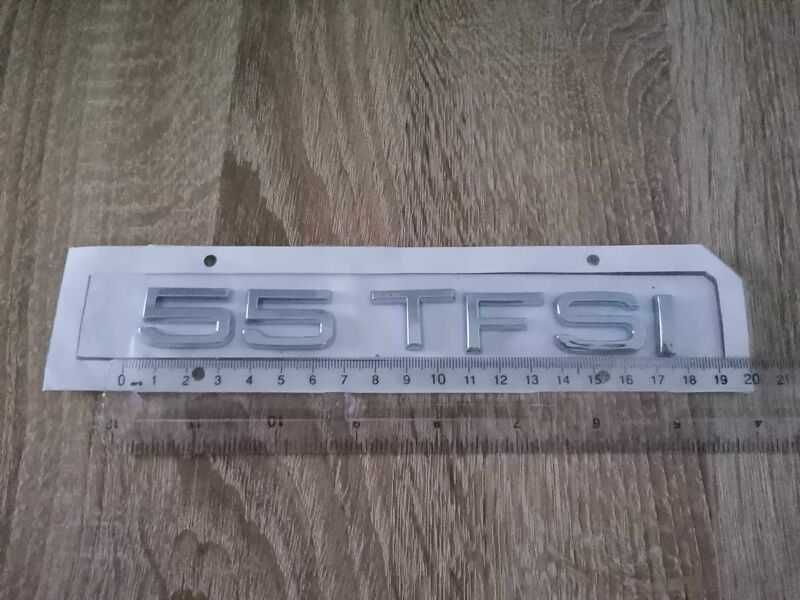 сребриста емблема Audi 55 TFSI
