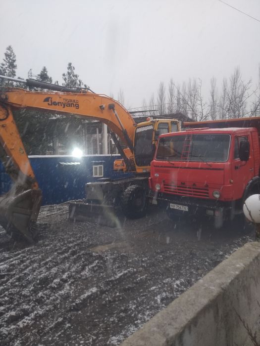 Услуга экскаватора по городу