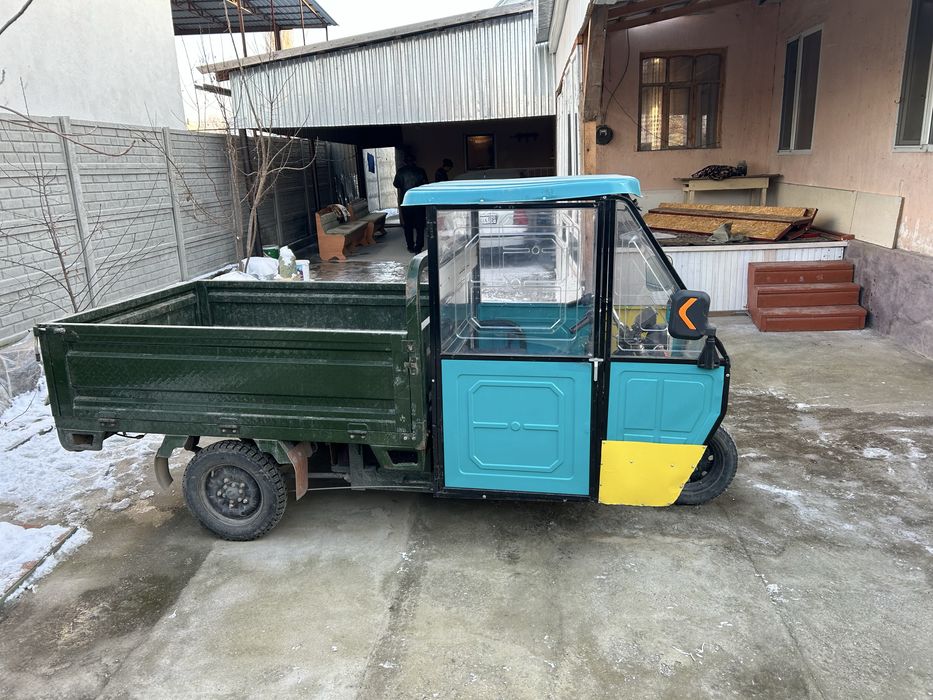 Мотороллер (трицикл)