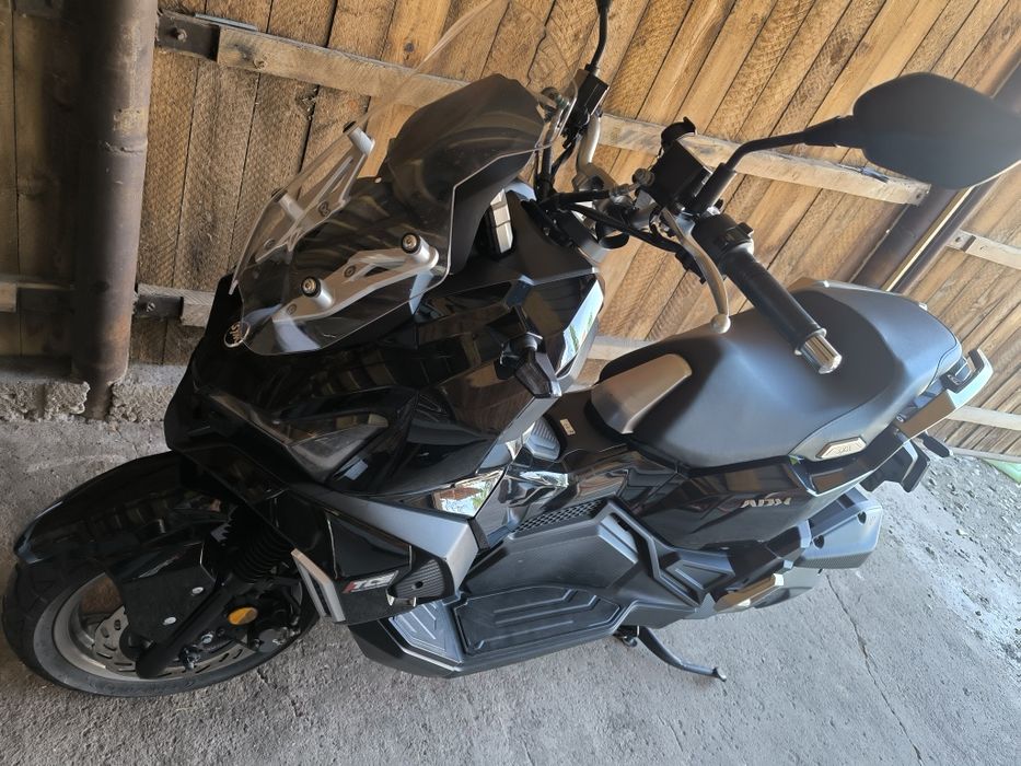 Vând sau schimb sym adx 125