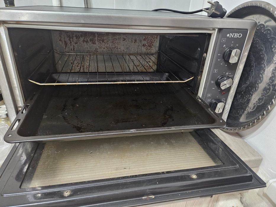 Продам электрическую печь Neo