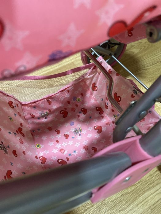 Игрушечня коляска, розовая