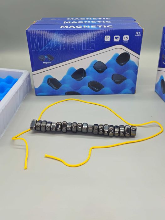 Хит! Магнитна семейна настолна игра с магнитни камъчета и въже (9+)