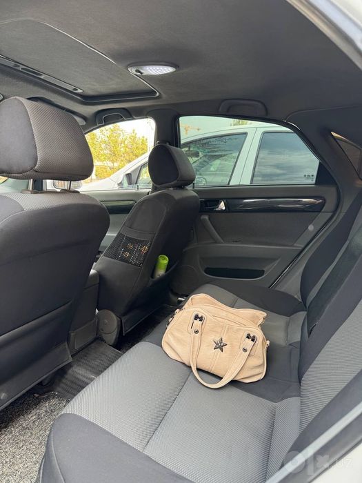 Chevrolet 2010 Lacetti avtomat Full Metan bor sotiladi