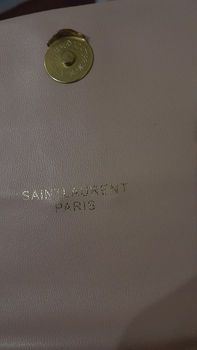 Бежевая сумка от бренда YSL