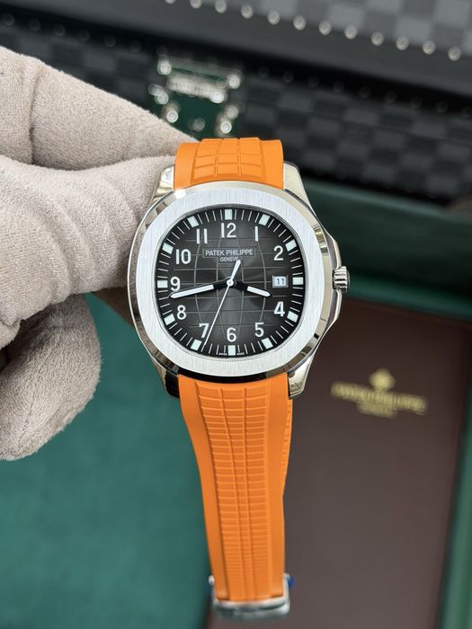 Patek Philippe Aquanaut – Black Dial, Orange Rubber Strap