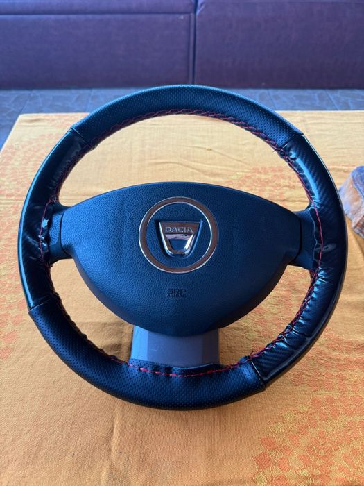 Vând volan Dacia Logan