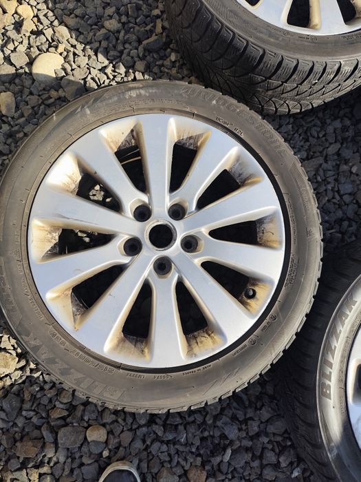 Set 4 jante aliaj 5X115 pentru Opel . Cu anvelope M+S 215/50R17.